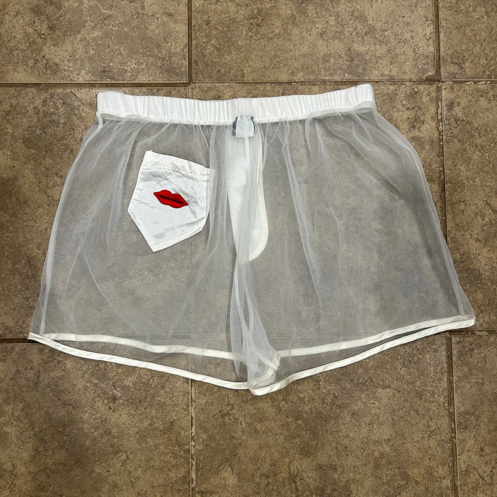 Vintage 1980’s Frederick’s of Hollywood white mesh shorts with lips